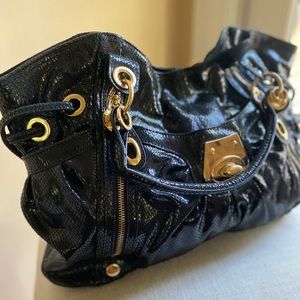 Black faux snake skin with gold hardware